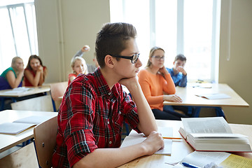 Image showing students gossiping behind classmate back at school