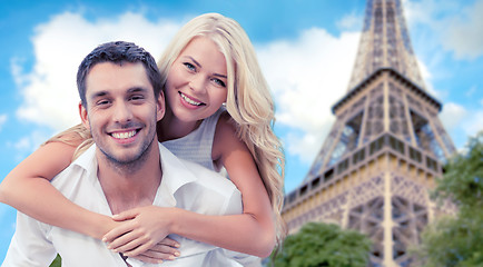 Image showing happy couple having fun over eiffel tower