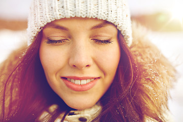 Image showing happy woman outdoors in winter