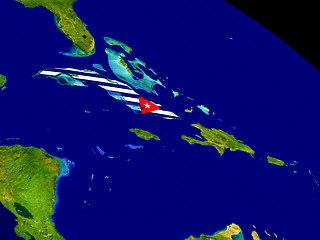 Image showing Cuba with flag on Earth