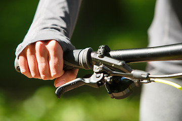 Image showing Woman hands on modern sport bike