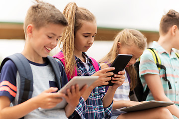 Image showing group of happy elementary school students talking