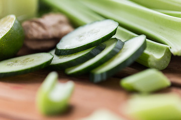 Image showing close up of celery stems and sliced cucumber