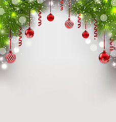 Image showing Christmas glowing background with fir branches, glass balls, str