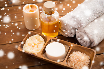 Image showing natural cosmetics and bath towels