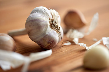 Image showing close up of garlic on wooden table