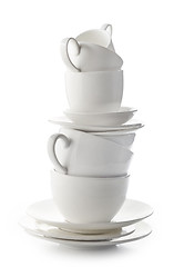 Image showing stack of white cups and plates