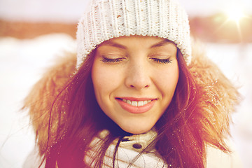 Image showing happy woman outdoors in winter