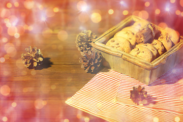 Image showing close up of christmas oat cookies on wooden table