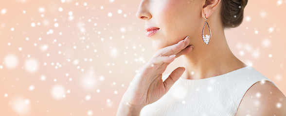 Image showing close up of beautiful woman face with earring