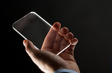 Image showing close up of businessman with glass smartphone