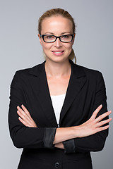 Image showing Beautiful young woman in business attire.