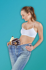 Image showing Woman became skinny and wearing old jeans