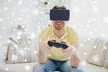 Image showing man in virtual reality headset with controller