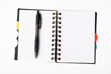 Image showing notepad with pen isolated