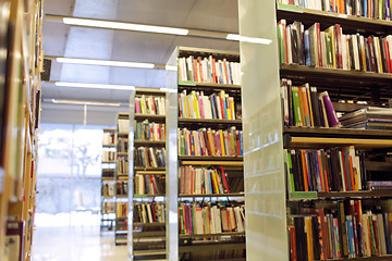 Image showing bookshelves with books at school library