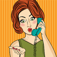 Image showing Surprised pop art  woman chatting on retro phone . Comic woman w