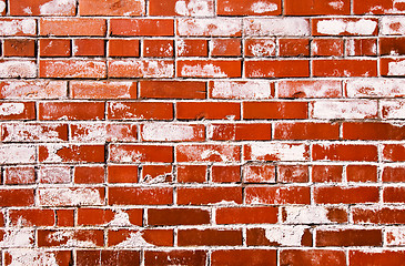 Image showing Bright red grungy brick wall