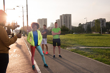 Image showing portrait multiethnic group of people on the jogging