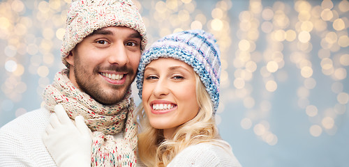 Image showing close up of happy couple in winter hats