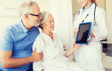 Image showing senior woman and doctor with tablet pc at hospital