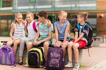 Image showing group of happy elementary school students talking