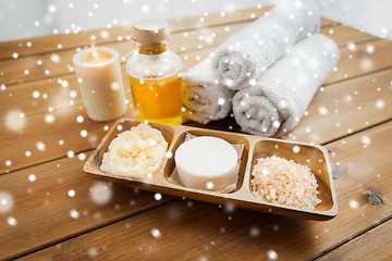 Image showing soap, himalayan salt, scrub in bowl, towel and oil