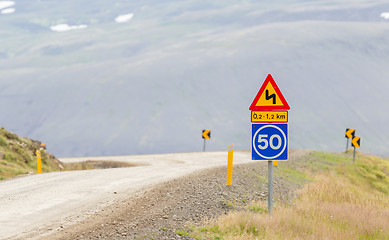 Image showing Curve with advisory speed limit