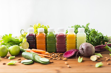 Image showing bottles with different fruit or vegetable juices