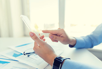 Image showing close up of woman with transparent smartphone