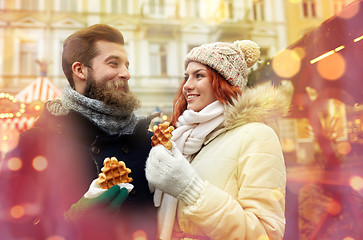 Image showing happy couple walking in old town