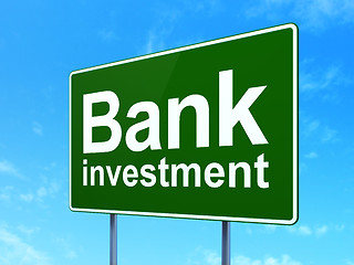 Image showing Currency concept: Bank Investment on road sign background