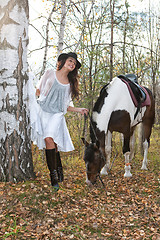 Image showing Young Woman And Horse