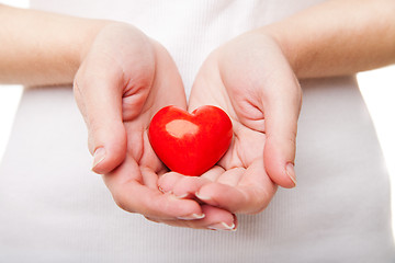 Image showing Woman\'s hand with heart symbol isolated
