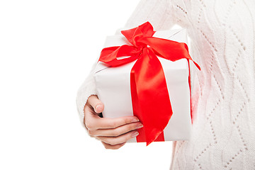 Image showing Woman with box of gift in hand on white isolated