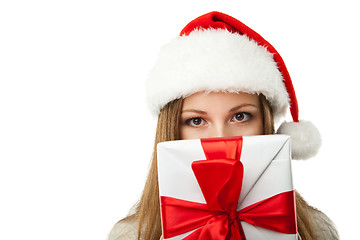 Image showing woman hold christmas gift on white background