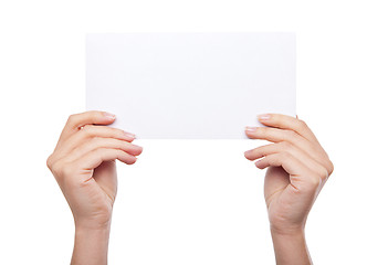 Image showing hand holding blank paper isolated 