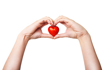 Image showing Woman\'s hand with heart symbol isolated