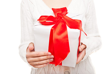 Image showing Woman with box of gift in hand on white isolated