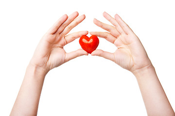 Image showing Woman\'s hand with heart symbol isolated