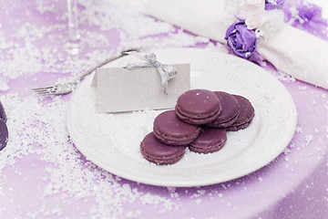 Image showing Purple macarons on plate