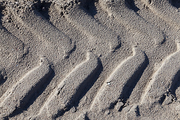 Image showing footprints in the sand truck