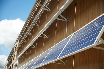 Image showing solar battery panels on building facade