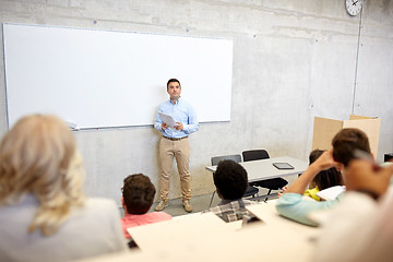 Image showing group of students and teacher at lecture