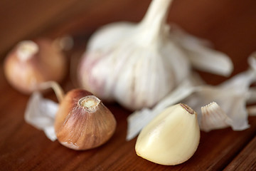 Image showing close up of garlic on wooden table