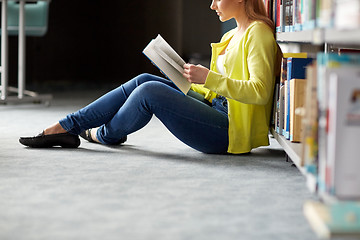 Image showing high school student girl reading book at library