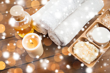 Image showing natural cosmetics and bath towels