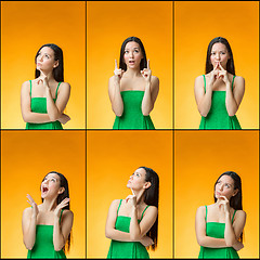 Image showing The thinking Chinese girl on yellow background