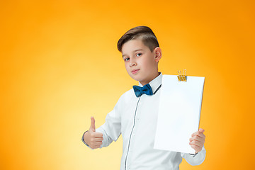 Image showing Happy boy showing thumbs up sign OK