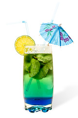 Image showing dual-layer cocktail with mint and lime in a tall glass two straws umbrella. Isolation, white bakground, clipping mask